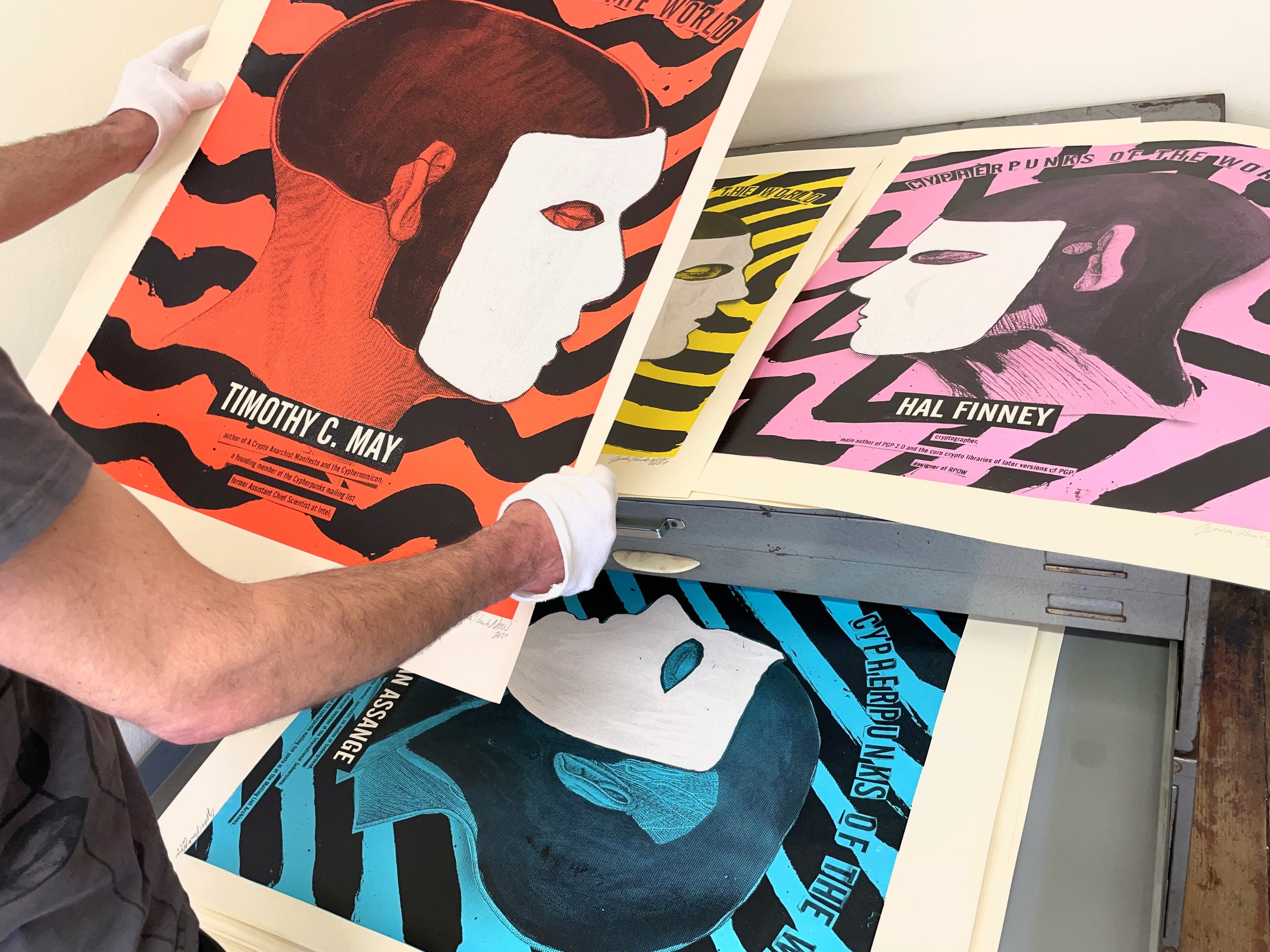 Cypherpunks Of The World — holding the Timothy C. May print