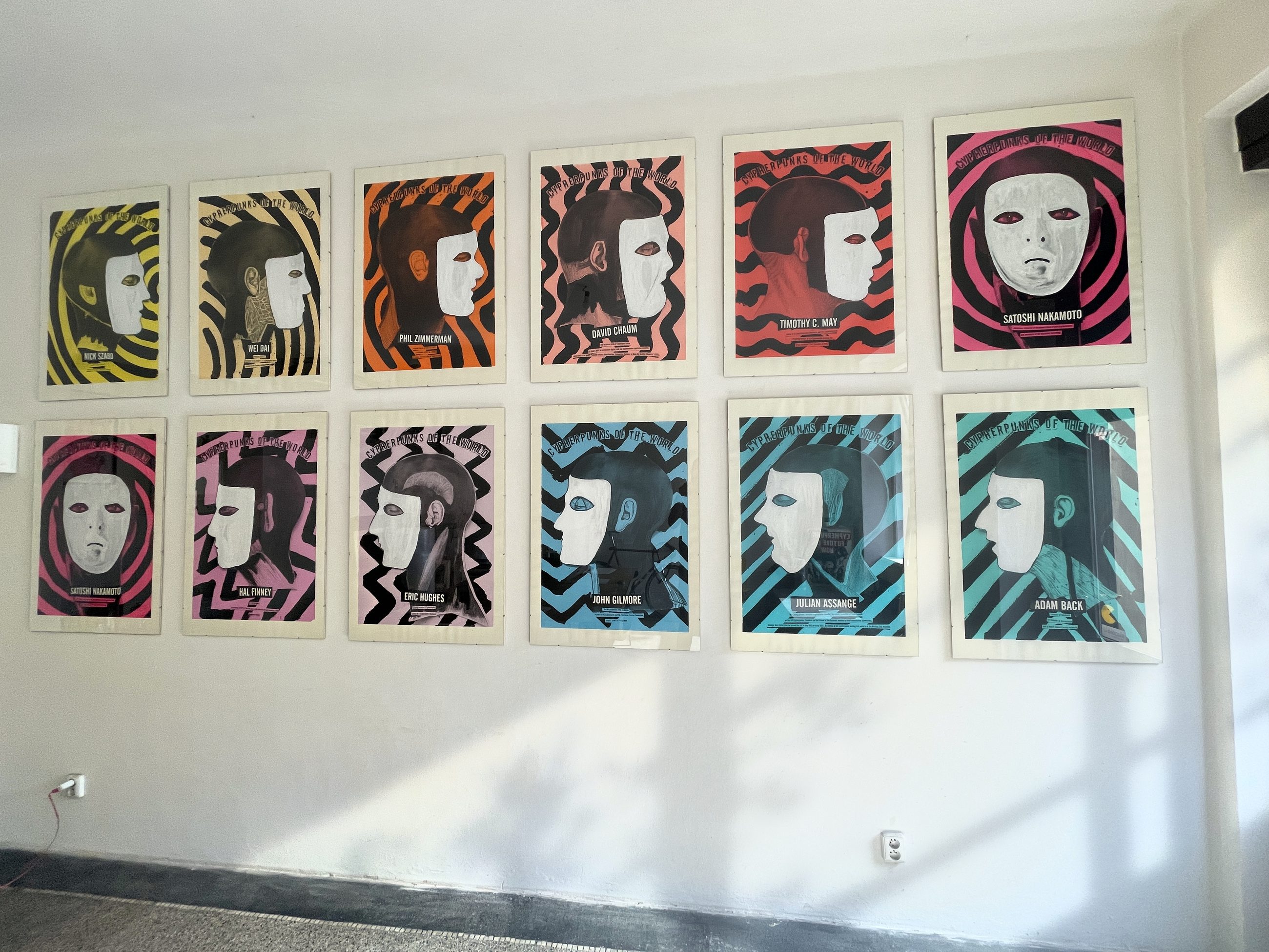 The Cypherpunks Of The World series in my studio, circa 2021 — full row