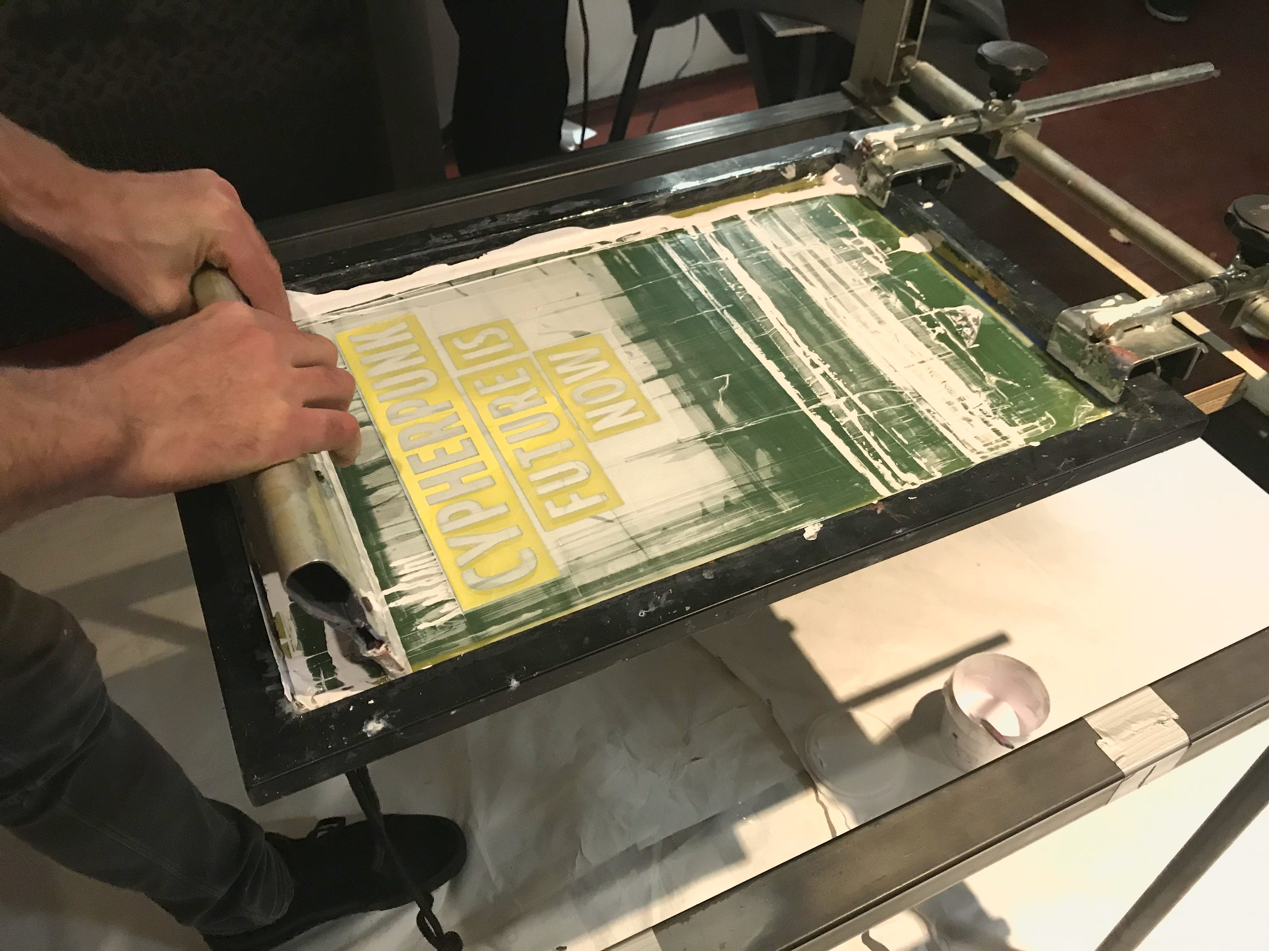 Screen printing session with CypherpunkNow — pulling the print