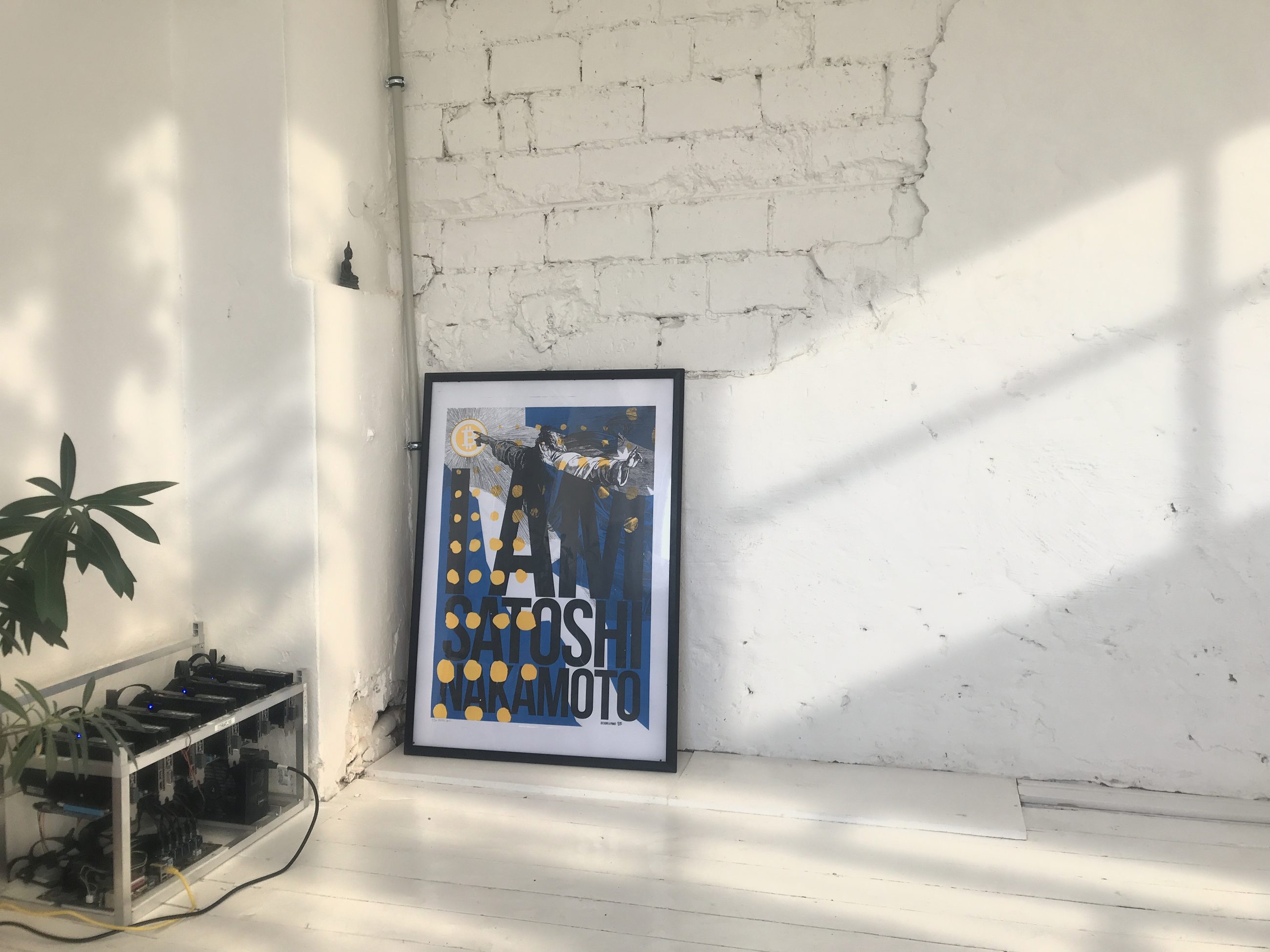 The I Am Satoshi Nakamoto print — my studio, heated by a mining rig, Továrna, circa 2017