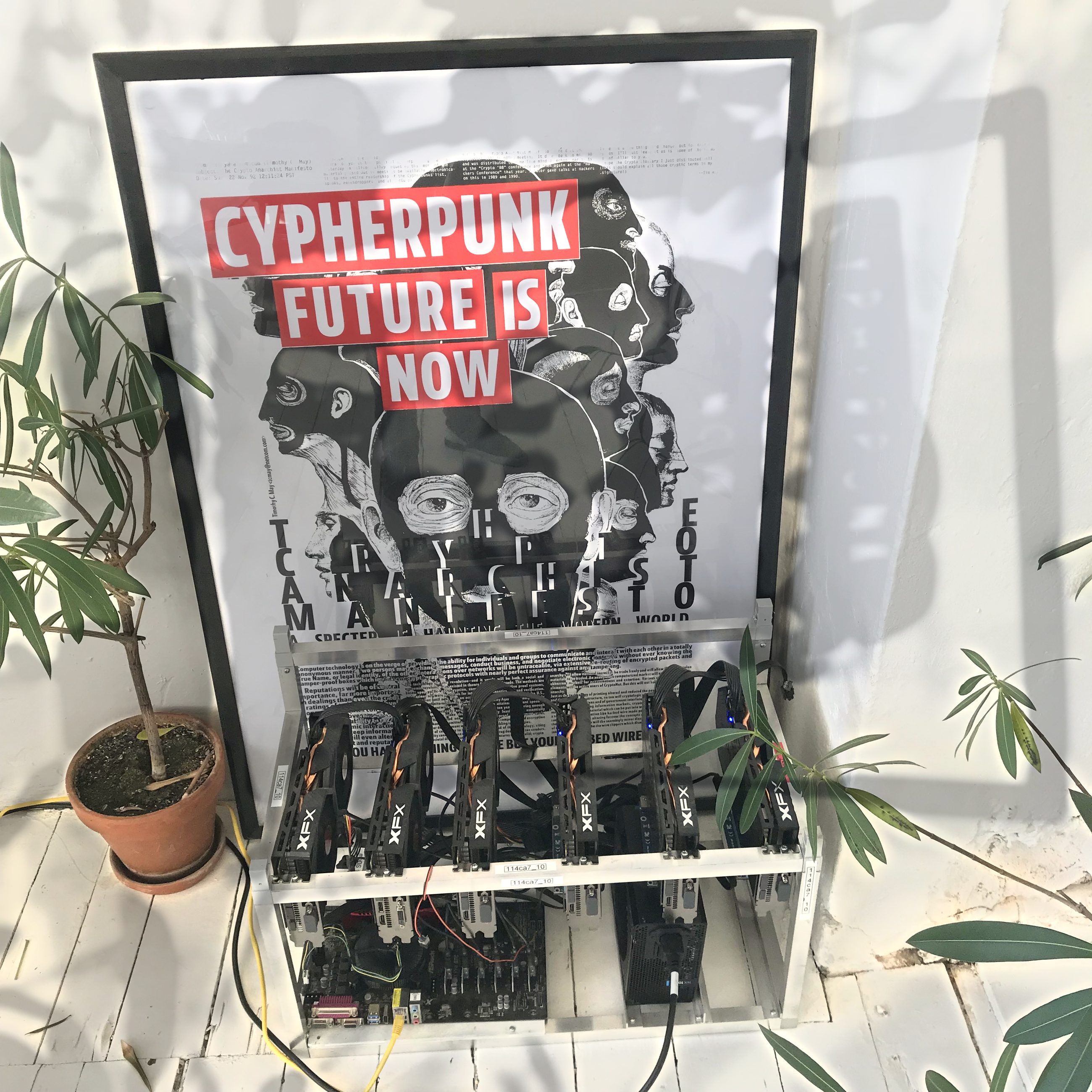 The Manifest of Cryptoanarchy print — my studio, heated by a mining rig, Továrna, circa 2017